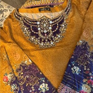 Ornate Yellow and Purple Dress with Embellished Neckline